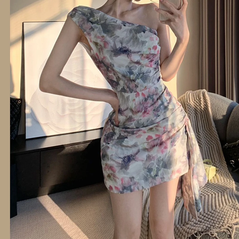 

Off-the-shoulder floral dress female 2024 summer new design sense niche irregular spice girl sexy tight hip skirt