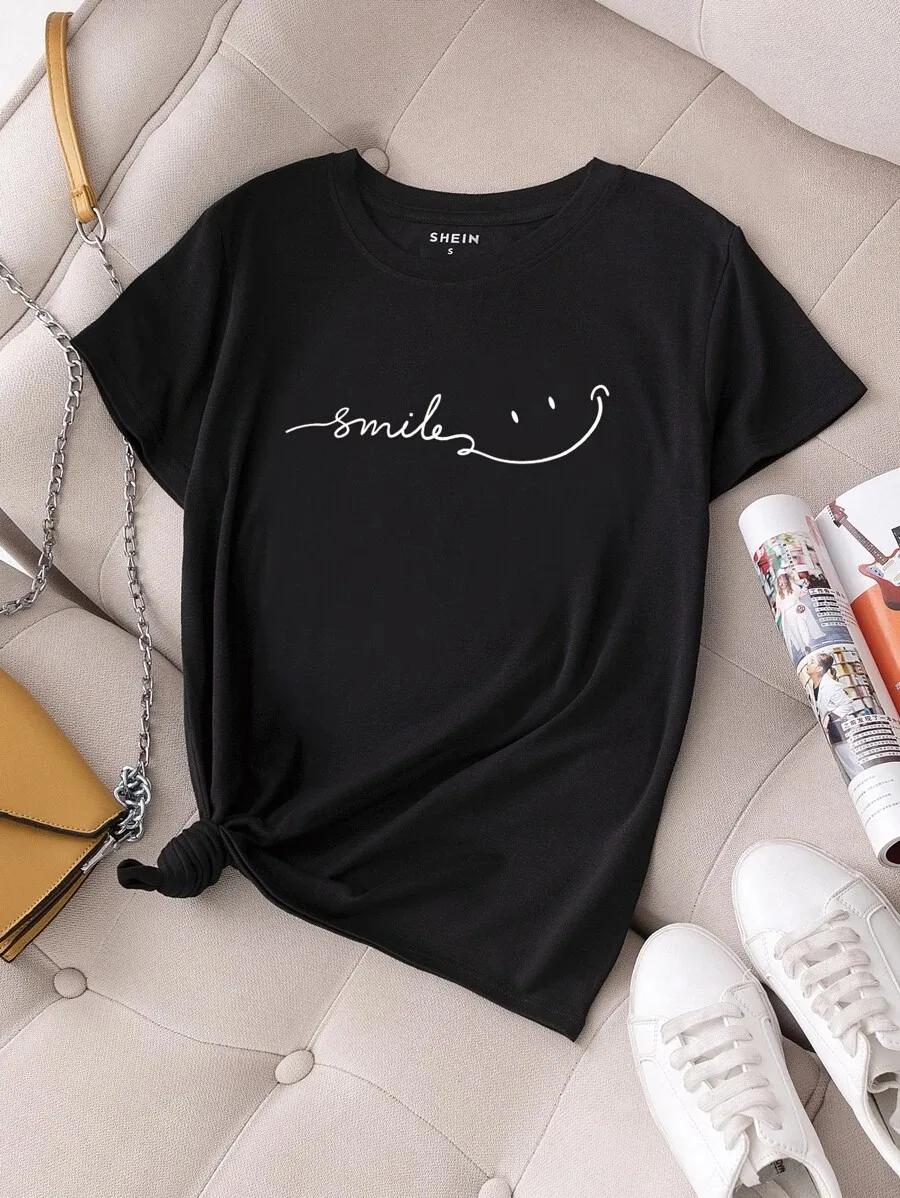 

Plus - Size Black Tee with “smile” Script & Smile Graphic