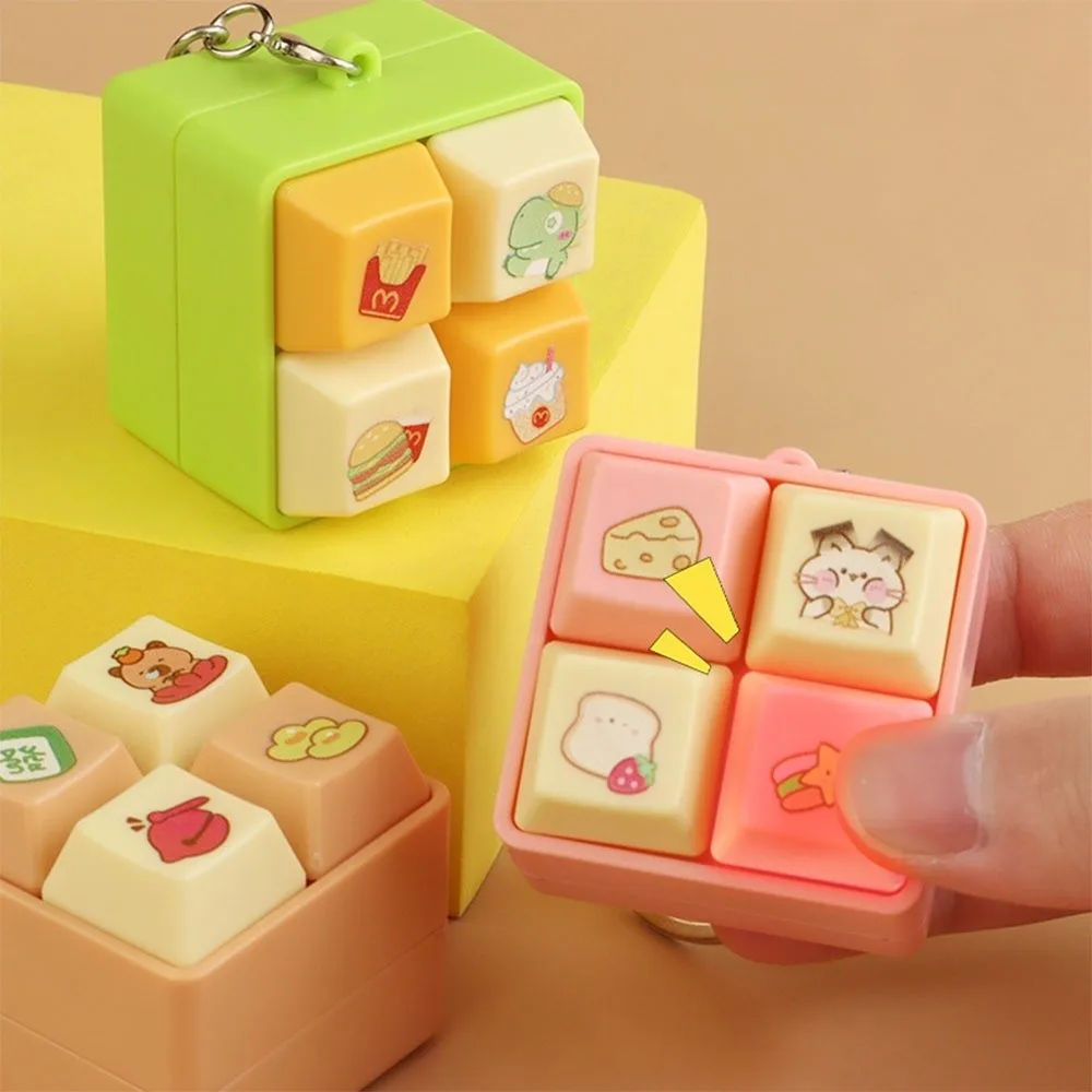 편안한 만화 피젯 키체인 DIY 키보드 키캡 스퀴즈 음악 키체인 스트레스 해소 시간 보내기 손가락 키보드 캡