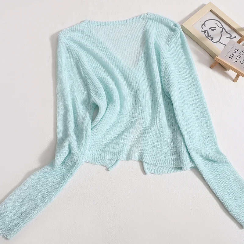 Cardigan a maniche lunghe lavorato a maglia con bottoni Casual da donna con scollo a v indossato al di fuori del mare camicia con protezione solare