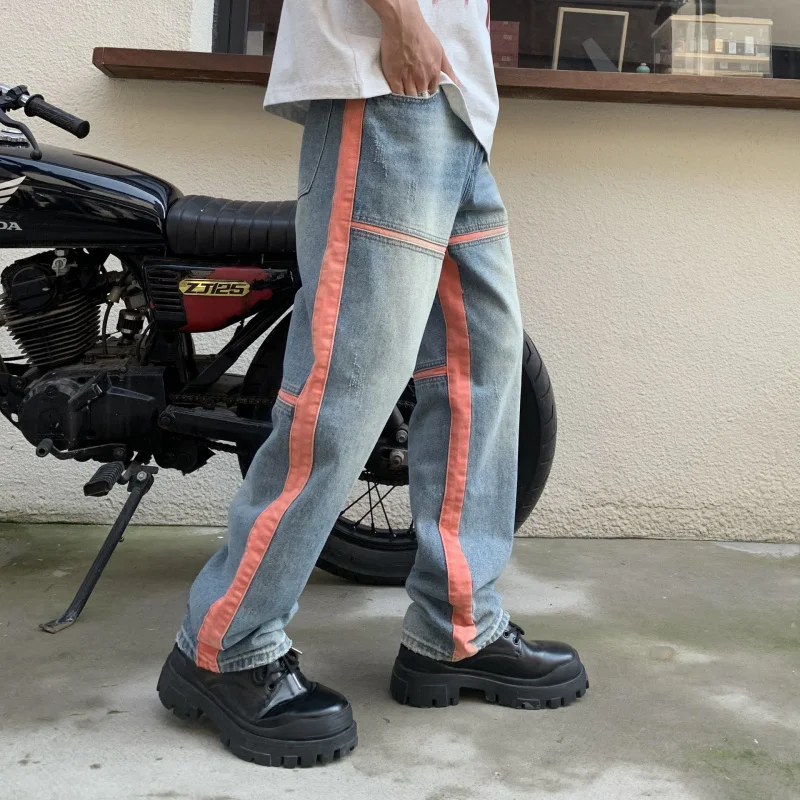 ออกแบบเสื้อผ้าผู้ชายอเมริกันตรงกางเกงยีนส์ผู้ชายหลวมบุคลิกภาพ Splicing Retro แฟชั่น Casual ล้างกางเกงผู้ชาย