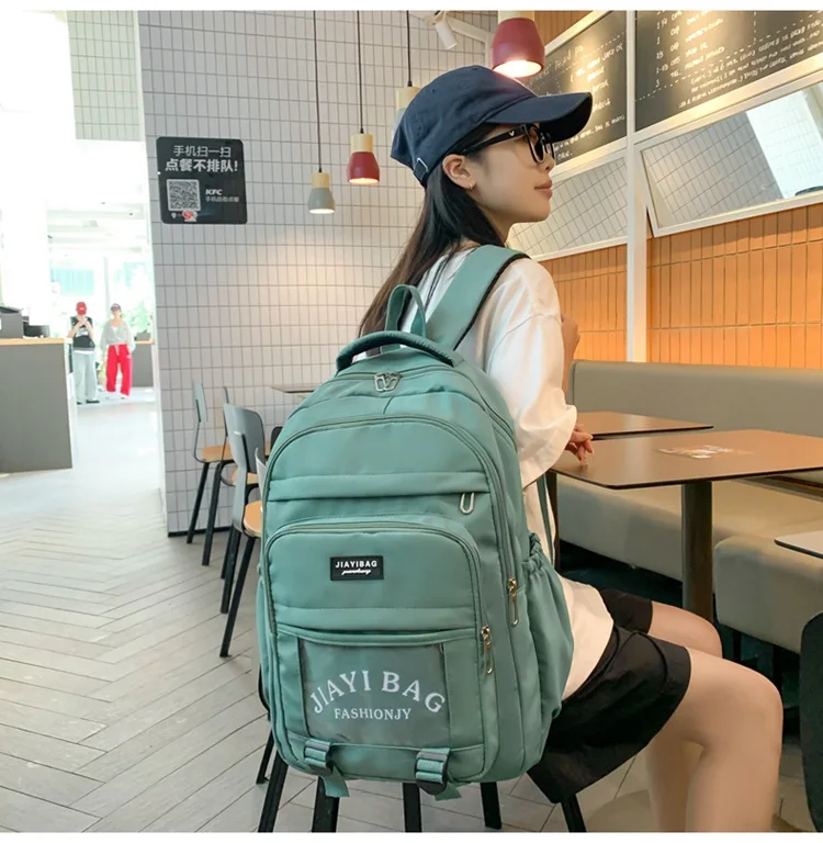 Female 2022 new fashion Korean version of the trend transparent letters backpack leisure simple college style schoolbag