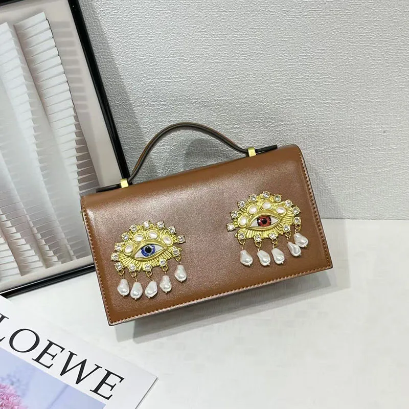 New Luxury Fashionable Design Sense Luxury Crystal Accents Elegant Clutch Evening Bag Female High Quality Eye Motif Pearl