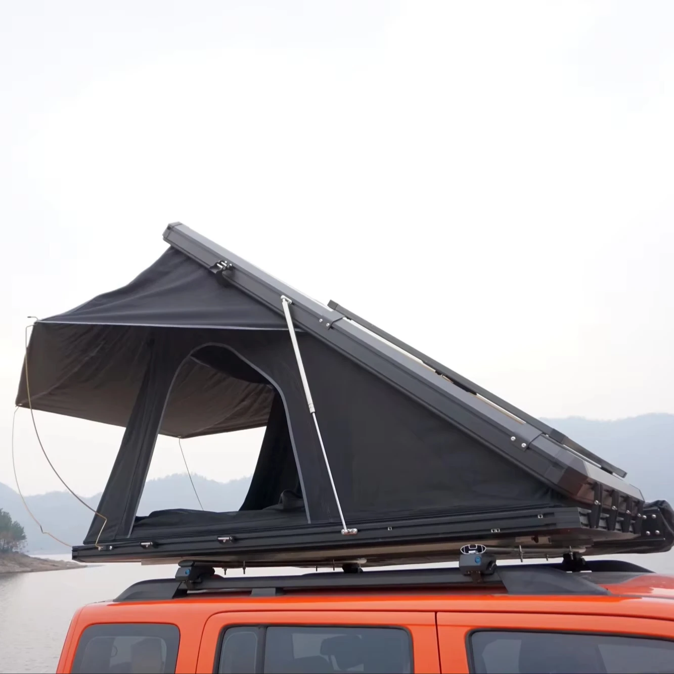 2025 iolina Compact Aluminum Hard Shell Auto Rooftop Tent Waterproof Canvas Roof Top for Outdoor Camping New SUV Tent Salecustom