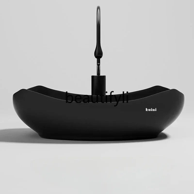 

Creative and simple washbasin on the washtable Art face wash basin Household design Sense Jane Europe Hotel basin