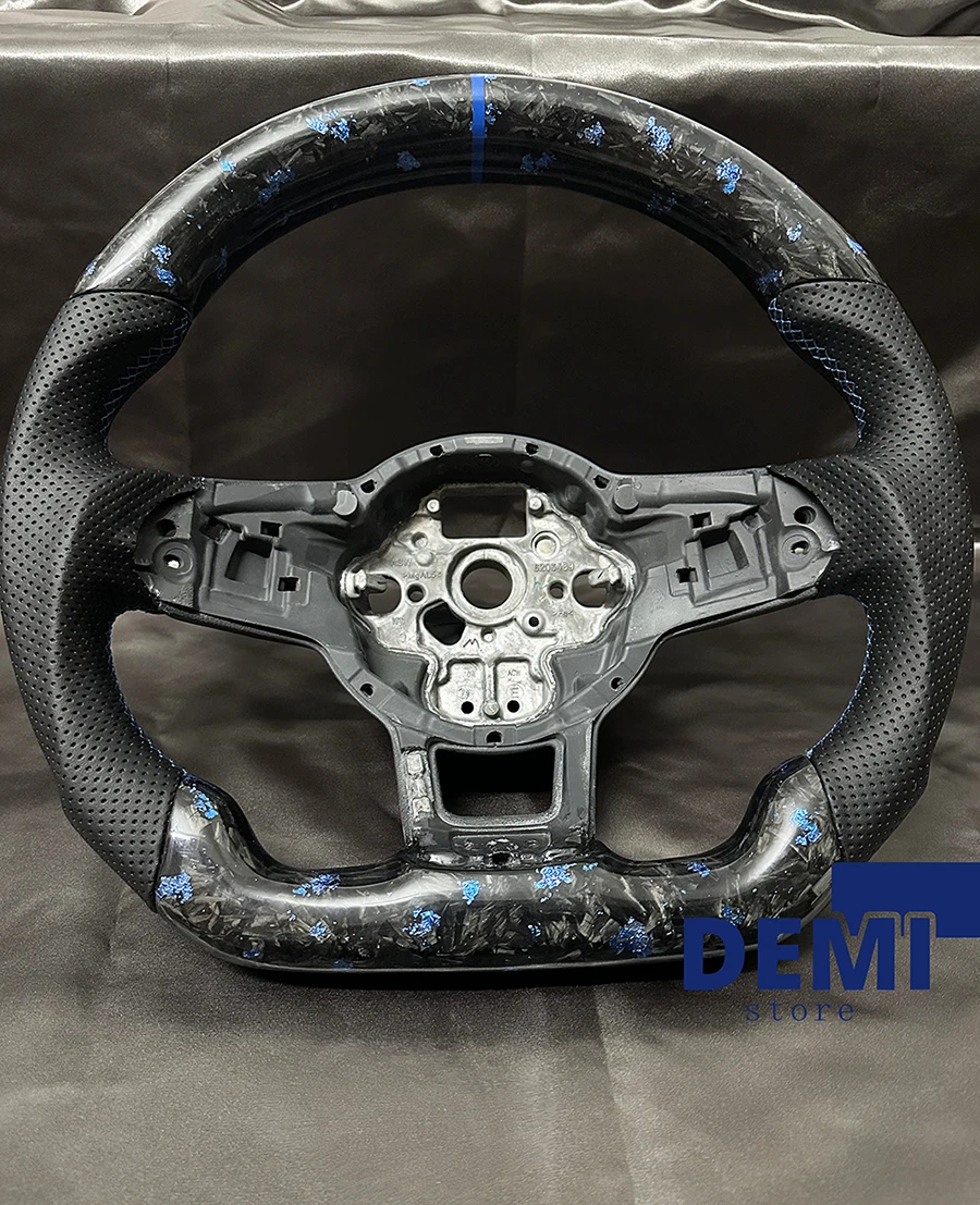 A genuinely forged carbon fibre steering wheel with blue foil and blue foil cover trim for Golf GTI R GTD GTE MK7