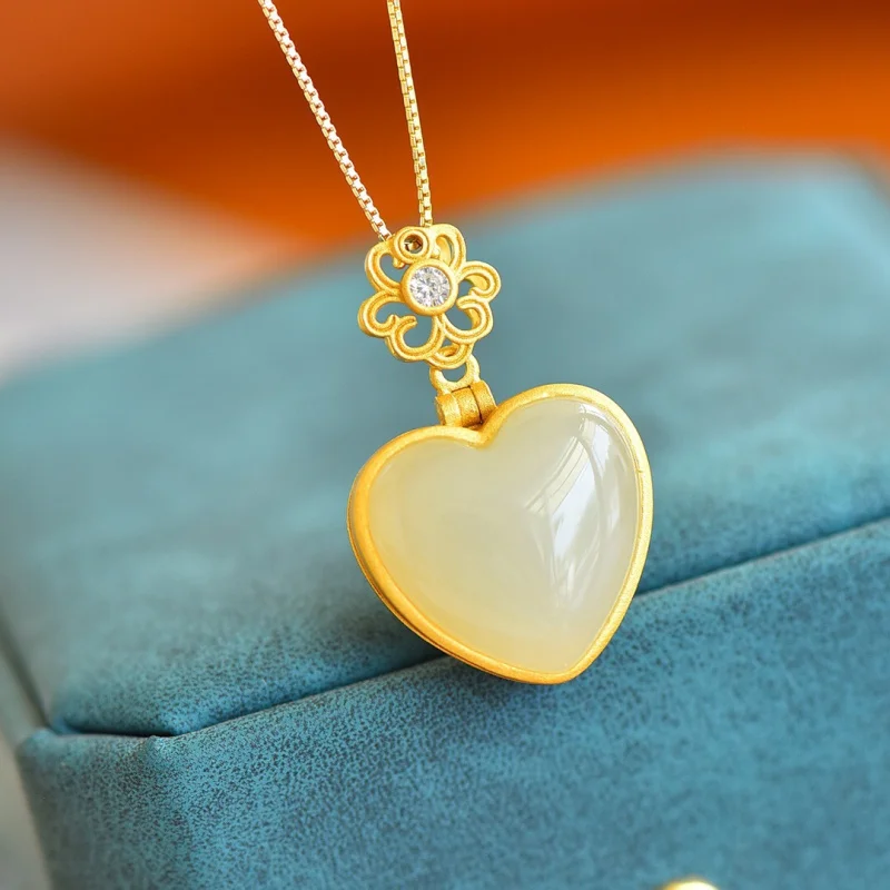 Hetian على شكل قلب طبل S925 الكيس المجوف اليشم قلادة قلادة