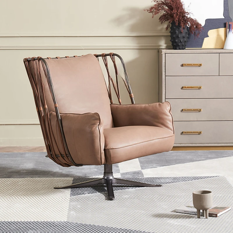 

The lounge chair has armrests and minimalist leather