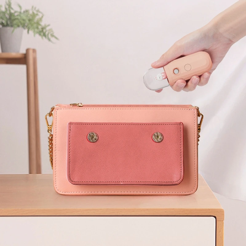 QYIYA เครื่องเพิ่มความชื้นใบหน้าสเปรย์นาโนแบบพกพาลายการ์ตูนไดโนเสาร์ตัวน้อยน่ารักจัดส่งแบบมือถือ