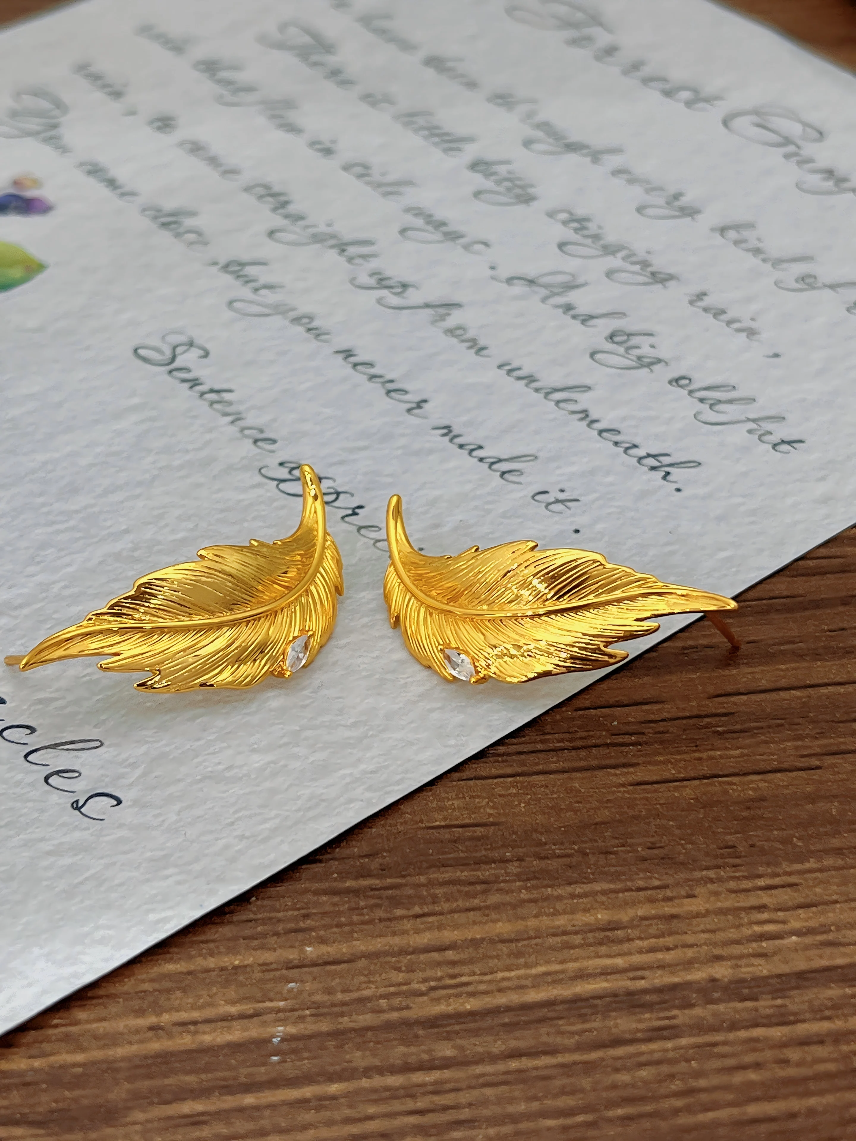 

Cross-border New Feather Earrings: Niche, Unique, Elegant Style Commuter-Friendly Accessories Factory Direct Wholesale