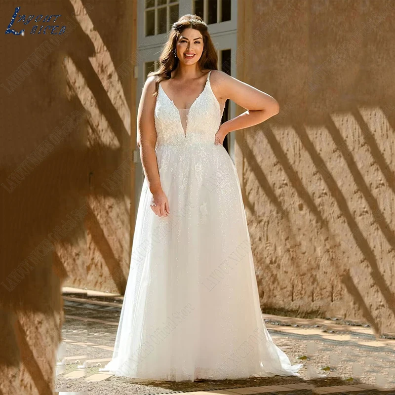 LAYOUT NICEB Vestidos De Casamento Para A Mulher Plus Size Spaghetti Strap Vestido De Noiva Backless A linha Tulle Custom Made Vestido De NoivaLAYOUT NICEB Vestidos De Casamento Para A Mulher Plus Size Spaghetti Strap