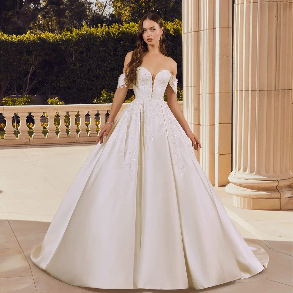 ロマンチックな A ラインのウェディングドレス大きく開いた恋人ネックアップリケカスタマイズされたブライダル成長オフショルダースリーブ Vestidos De Novia