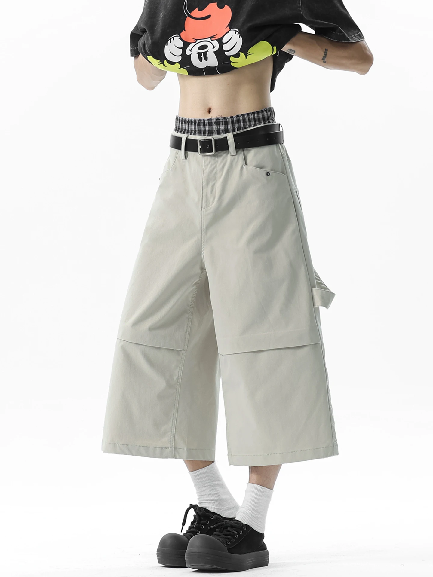 

Американские ретро сращенные бревно, широкие брюки на семь футов, мужские летние новые свободные повседневные простые повседневные брюки выше колена, рабочая одежда