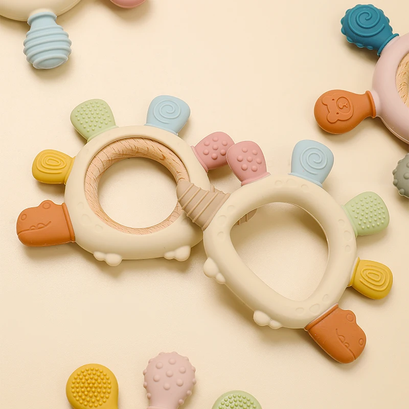 الكرتون ستيجوسورس الطفل حلقة خشبية سيليكون ألعاب التسنين سهلة الإمساك هدية الوليد BPA الحرة الملونة الرضع مضغ لعبة المولي