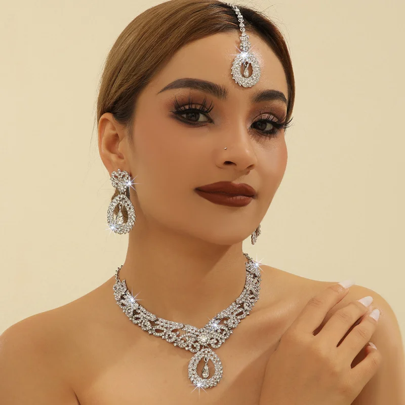 

Wholesale Direct Sale White Rhinestone Necklace Earrings Forehead Chain Three-Piece Set Gold Indian Bride Wedding Jewelry Gift