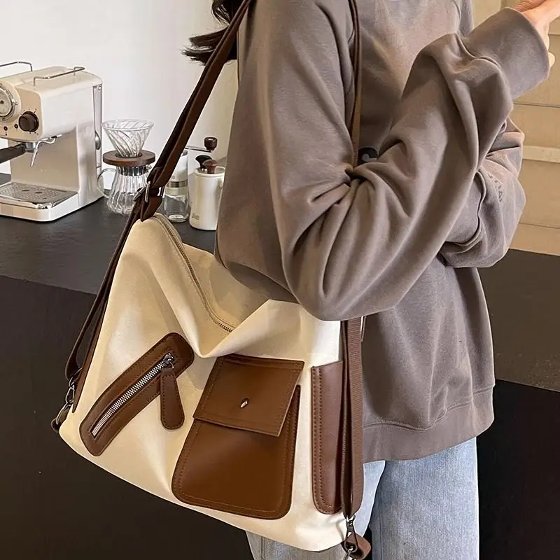 Bolso de mano de gran capacidad para mujer, bolsos de un solo hombro de lona versátiles, mochila de viaje saliente de moda Ins, XK229