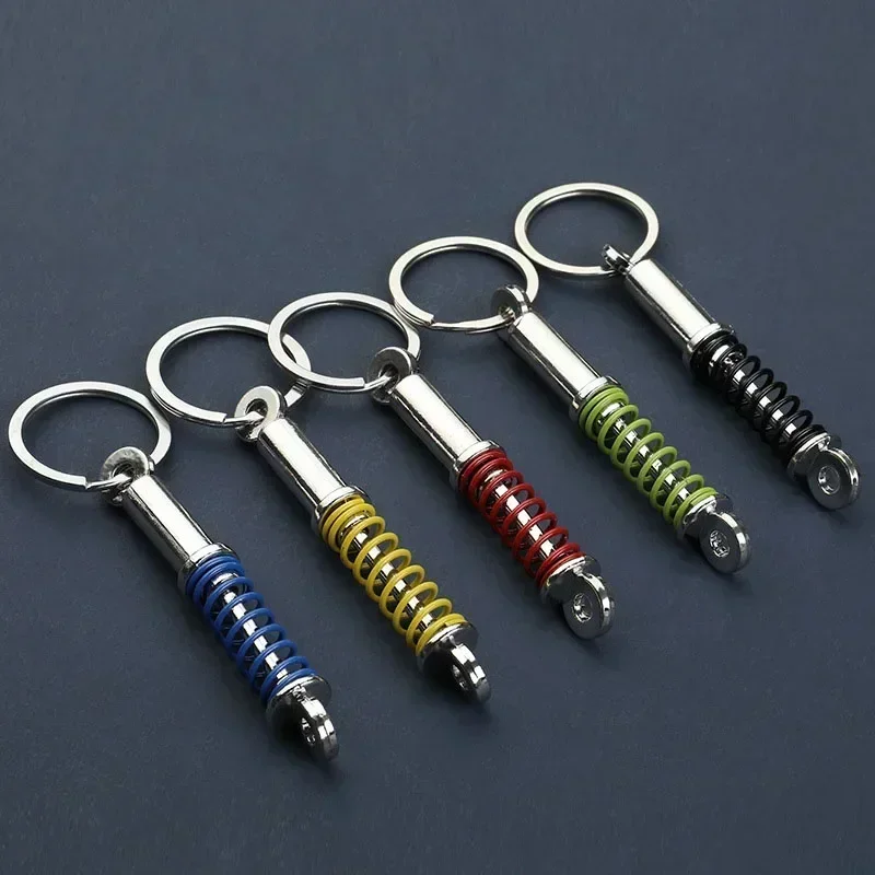 Metal Car Accessories Shock Absorber Keychain for Nissan Nismo Sylphy Sentra Qashqai Xtrail Altima Tiida Xterra Almera Teana