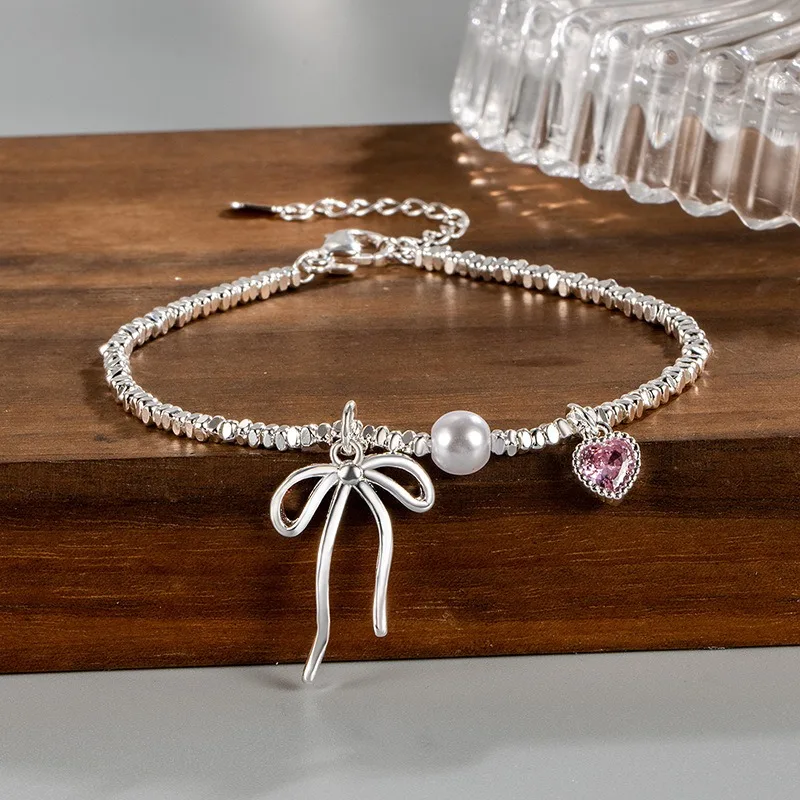 سوار على شكل قلب وردي من الفضة الإسترليني عيار 925 للنساء، سلسلة مجوهرات أنيقة على شكل فيونكة من اللؤلؤ هدية لحفلات أعياد ميلادها