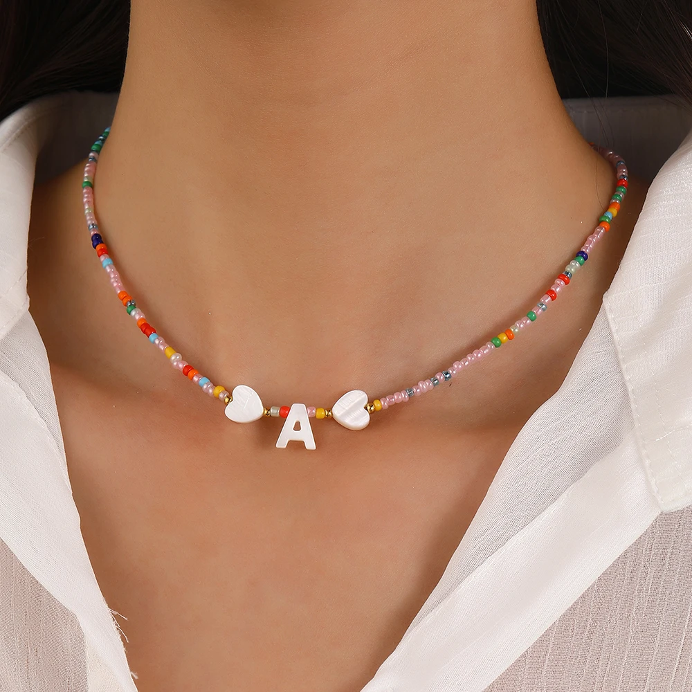 Bohemian style women's necklace with heart-shaped shell first letter colored rice bead necklace fashionable women's jewelry 2025