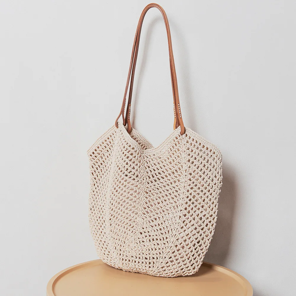 

Women's Large Capacity Hand Woven Leather Bag Casual Versatile Lazy Beach Armpit Shoulder Bag