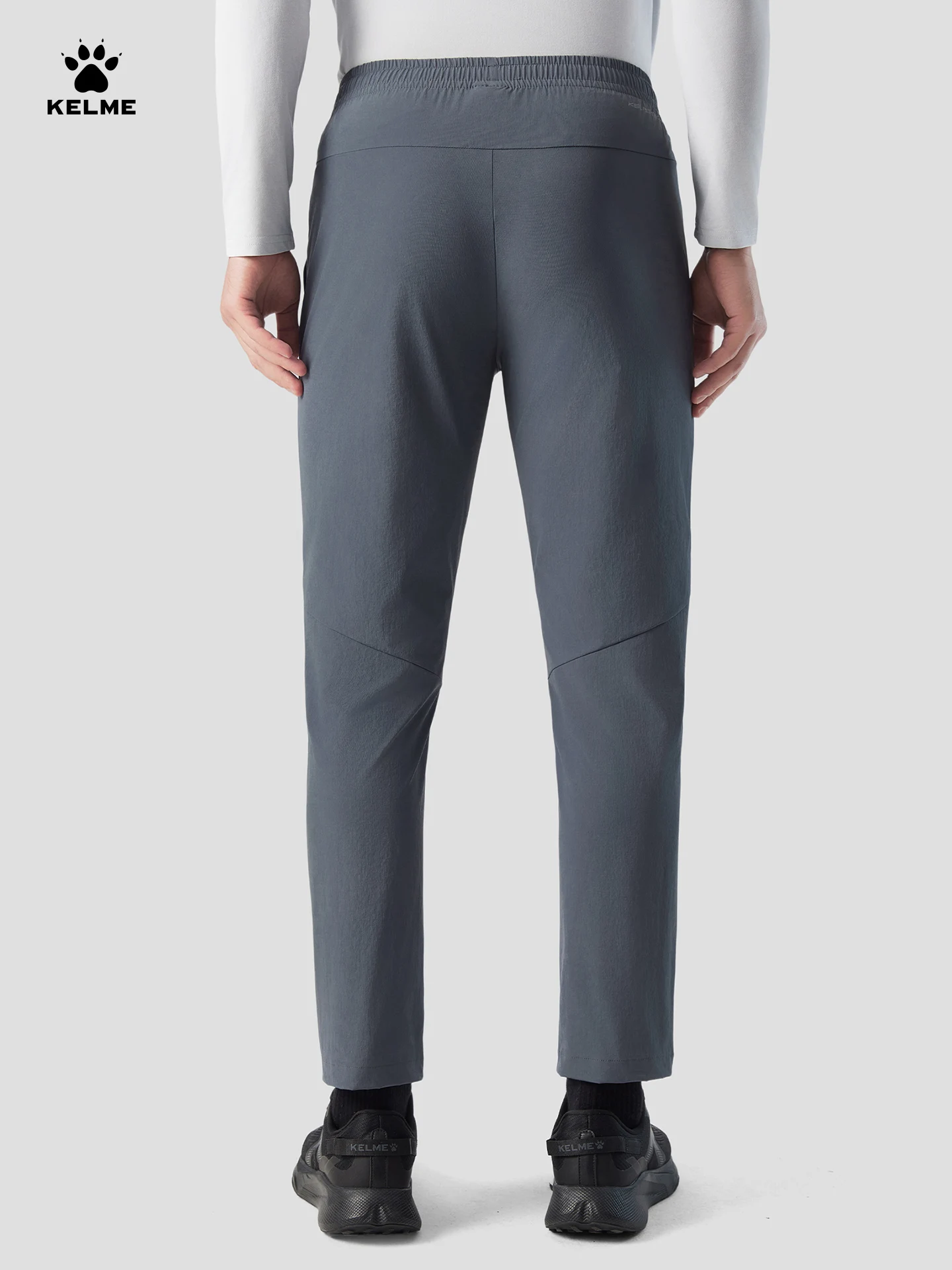 Kelme الرجال السراويل الرياضية التجفيف السريع الخريف السراويل المنسوجة التدريب سراويل تقليدية المشي لمسافات طويلة في الهواء الطلق تشغيل السراويل