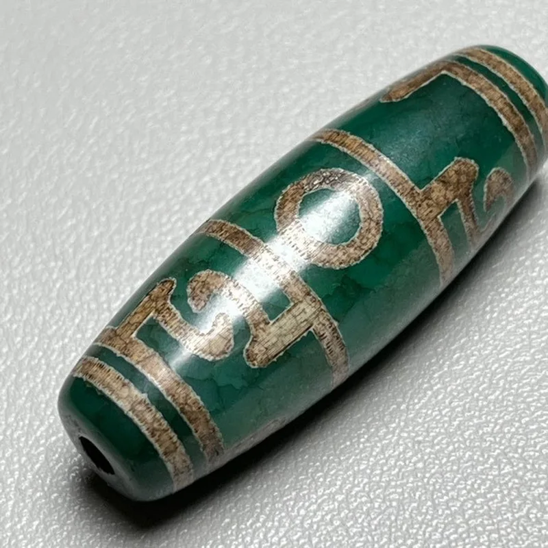 Antique and miscellaneous items returned from Tibet: green dragon-patterned old agate Lotus Master's instrument, three-eyed vint