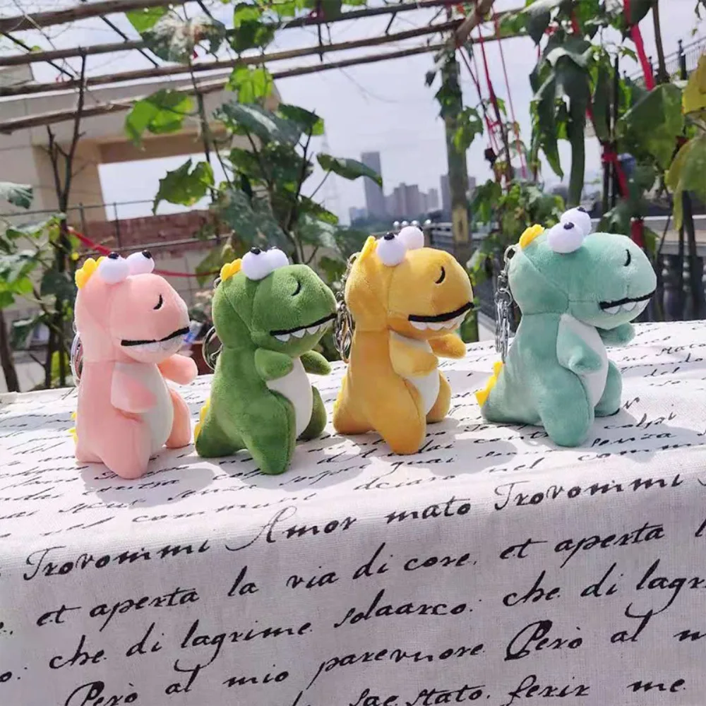 Llaveros de peluche de dinosaurio de dibujos animados de animales de peluche, llavero de peluche de dinosaurio suave, bonito colgante de mochila no tóxico