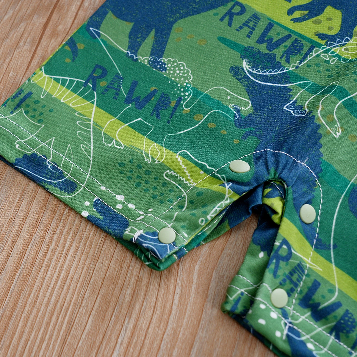 Urnxb-رومبير بأكمام قصيرة مع طبعة ديناصور لحديثي الولادة ، بذلة قطعة واحدة مع حمالة للأولاد من 0 إلى 12 عامًا ، الصيف