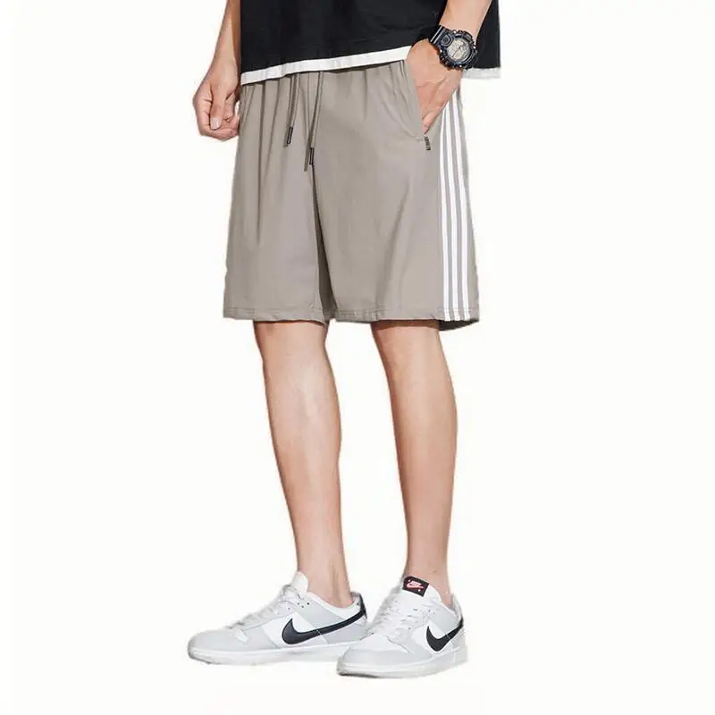 Zg shorts masculino verão novo estilo na moda marca solta casual listrado calças de praia seda gelo respirável calções esportivos