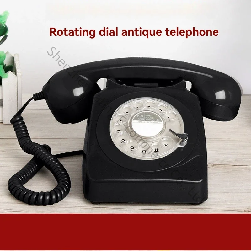 Metal-ringed fixed-line telephone, retro antique telephone with rotary dial, old-fashioned landline.