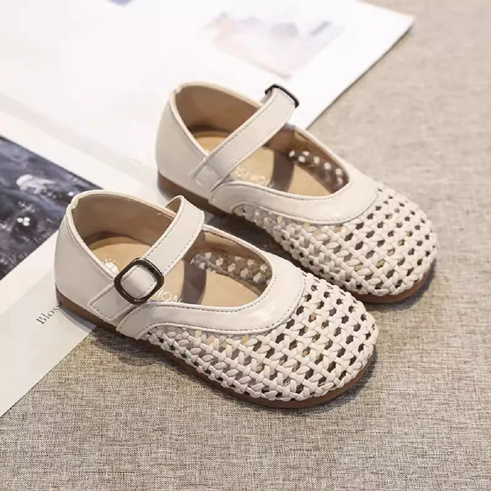 

Girls' Shoes 2024 Summer New Children's Woven Grandmother Shoes Large Children's Hollowed Out Soft Soled Leather Wrapped Sandals