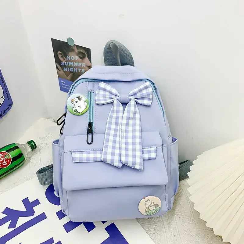 BOMO-mochila Kawaii rosa con pajarita para mujer, bolso de diseño versátil informal con Cremallera de nailon, a la moda, 2024