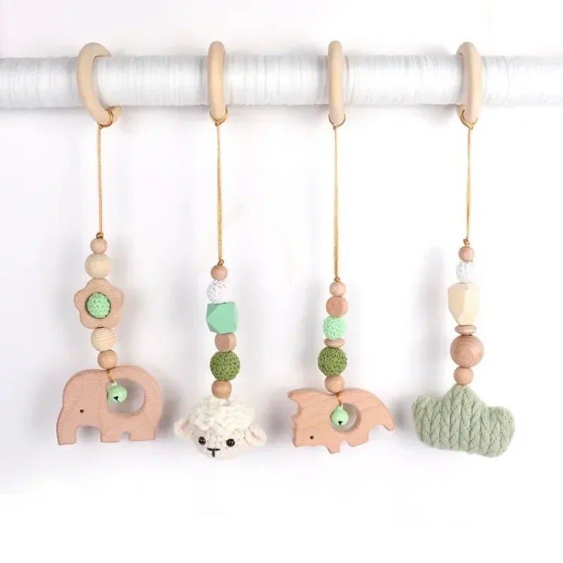 4Pcs/Set Baby Rattles Baby Play Gym Frame Wooden Beech Teether Trolley Stroller Hanging Pendants Toys Ring Nursing Rattle Toys