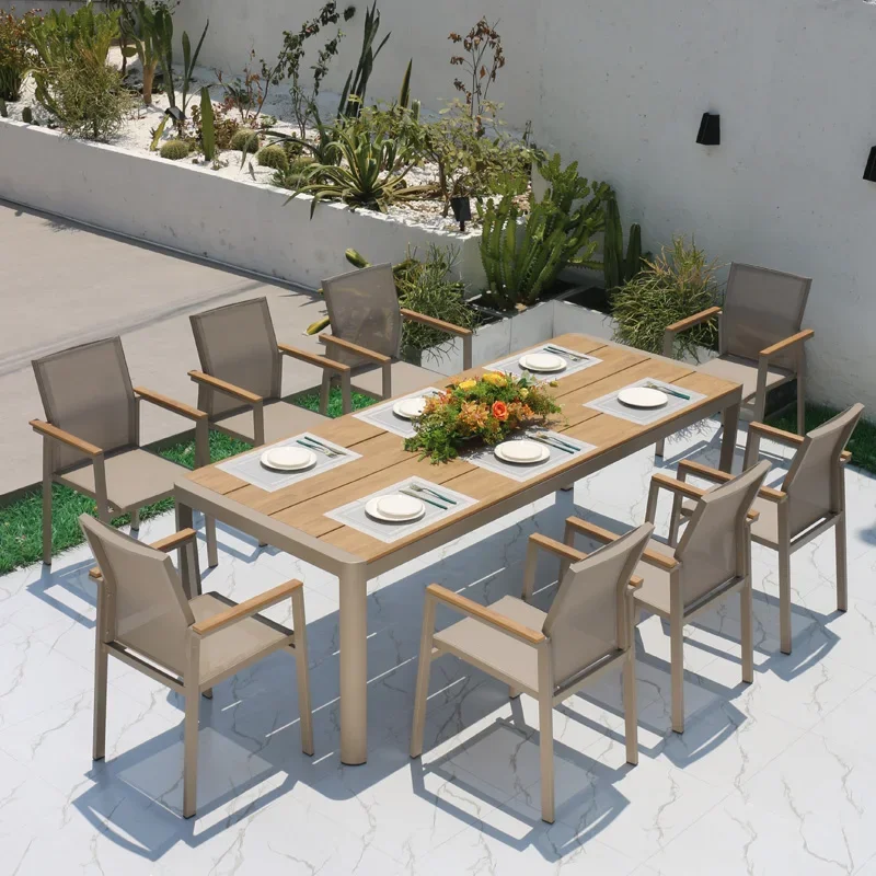 

Outdoor leisure garden tables and chairs outside the courtyard with waterproof and sunscreen tables for plastic wood meals