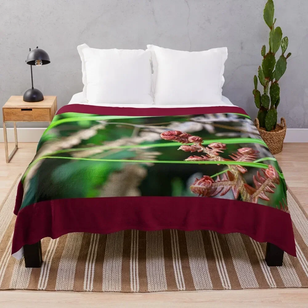 

Ama'u Fern Unfurling Throw Blanket