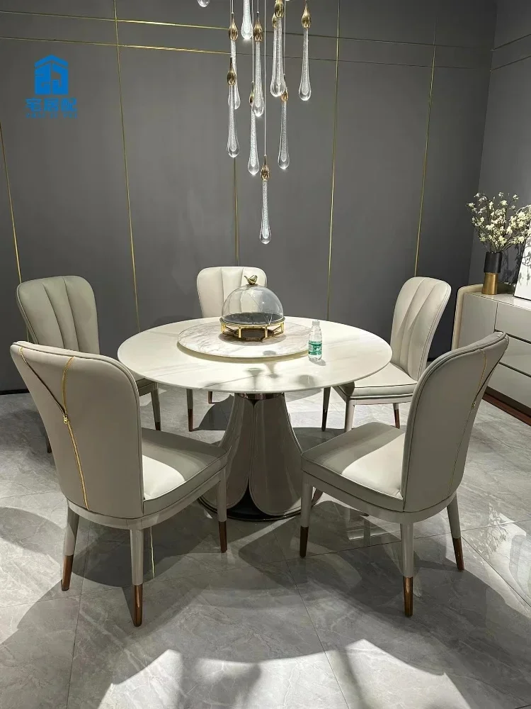 Italian light luxury post-modern high-end restaurant round table jazz white natural luxury stone dining table chair