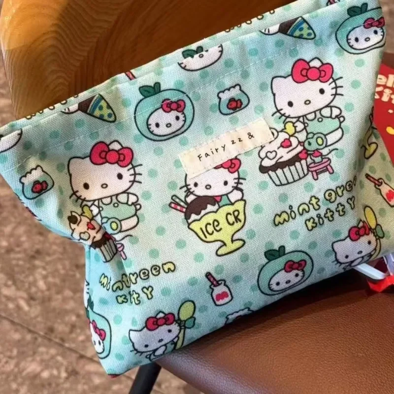 

Sweet Hello Kitty Anime Kawaii Fashion Canvas Bag Cute Cartoon Sanrio Ins Kt Cat Makeup Storage Bag Lovely Gifts for Girls