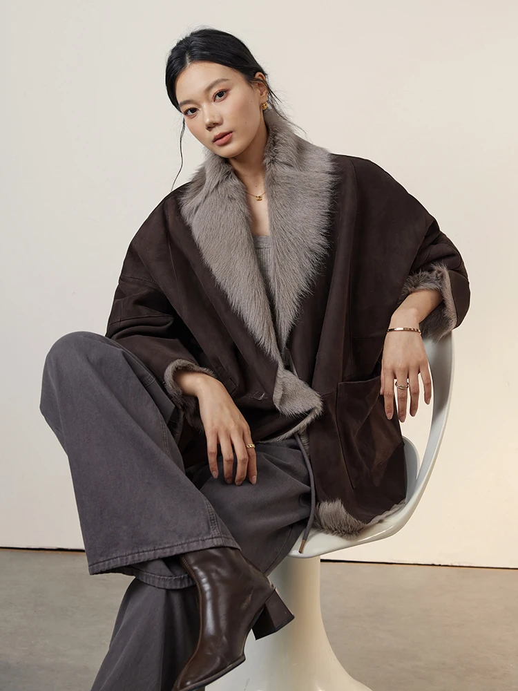 Abrigo de invierno de piel de cordero Toscana de lujo de alta gama para mujer 2025 nueva chaqueta de gamuza de piel auténtica de cabra de longitud media Vintage Simple