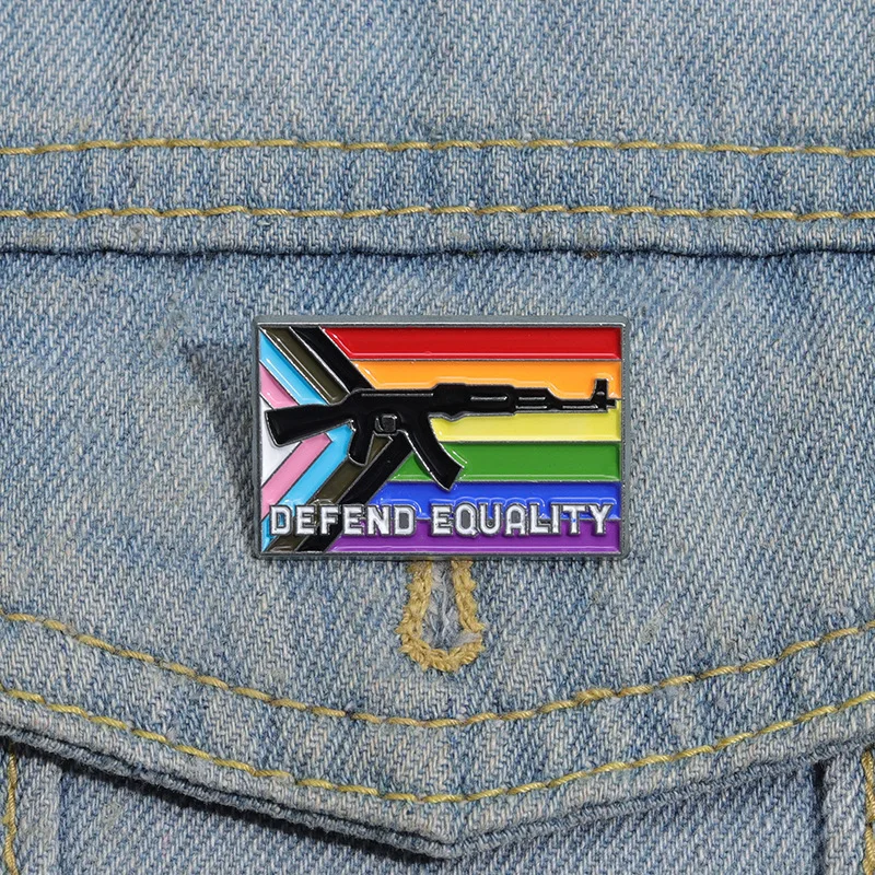 Defend Equality Enamel Pin LGBTQ Pride Trans Flag And Rifle Brooch Lapel Backpack Badge Jewelry Gift For Gay Friends