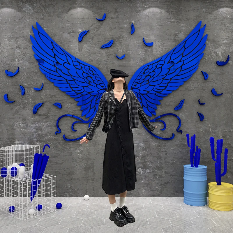 The wing wall pasting area is arranged with clock in background, and the wall is decorated with Klein blue pendulum