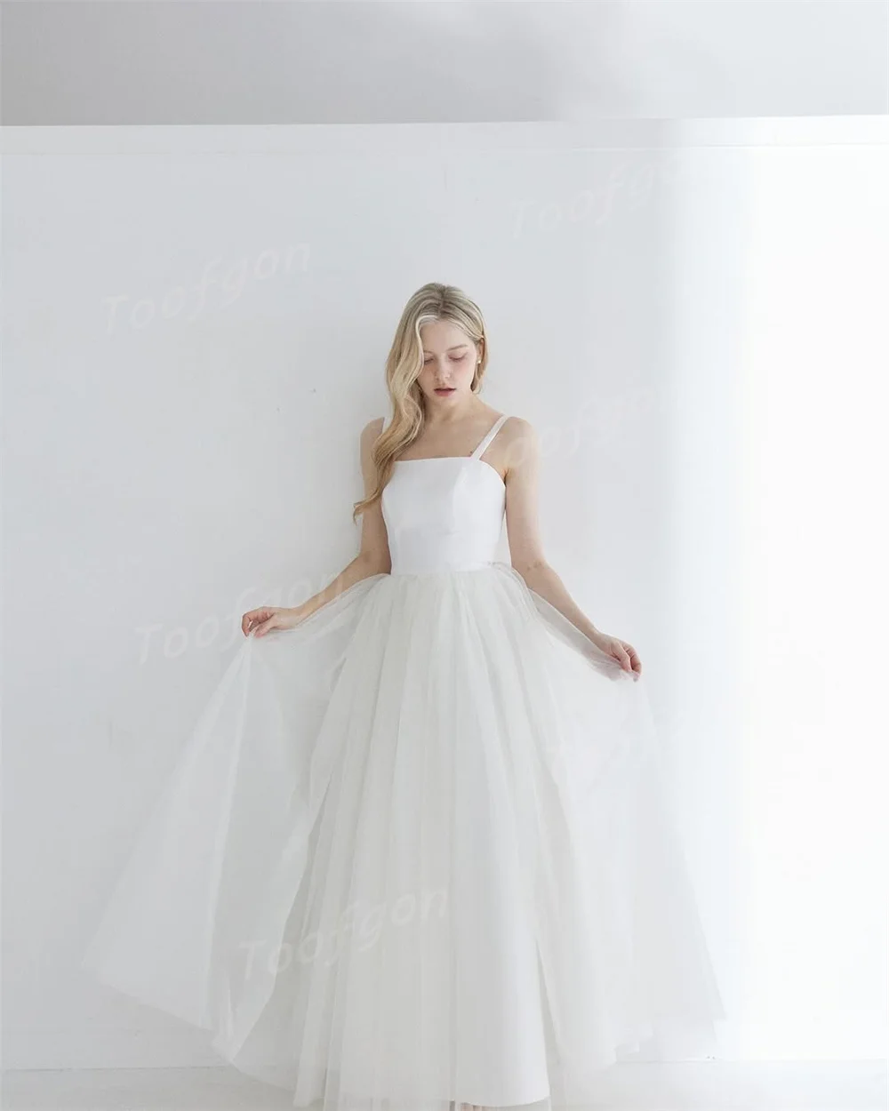 Toofgon بسيط السباغيتي حزام ألف خط فساتين الزفاف الساتان تول بلا أكمام ثوب العروس مخصص مشد عارية الذراعين فستان الزفاف