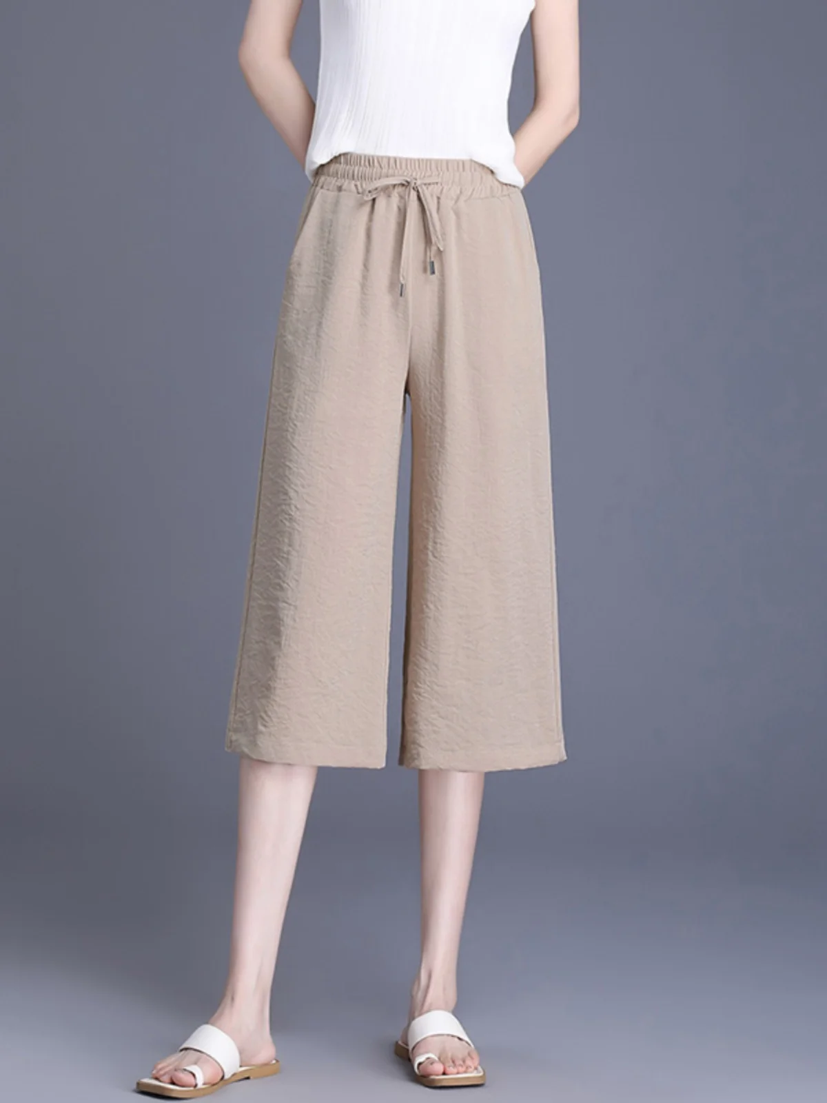 กางเกงขายาวทรงหลวมสำหรับฤดูร้อน ผู้หญิงไซส์ใหญ่ เอวสูง ความยาวเจ็ดส่วน สไตล์ลำลอง เหมาะสำหรับคุณแม่วัยกลางคน