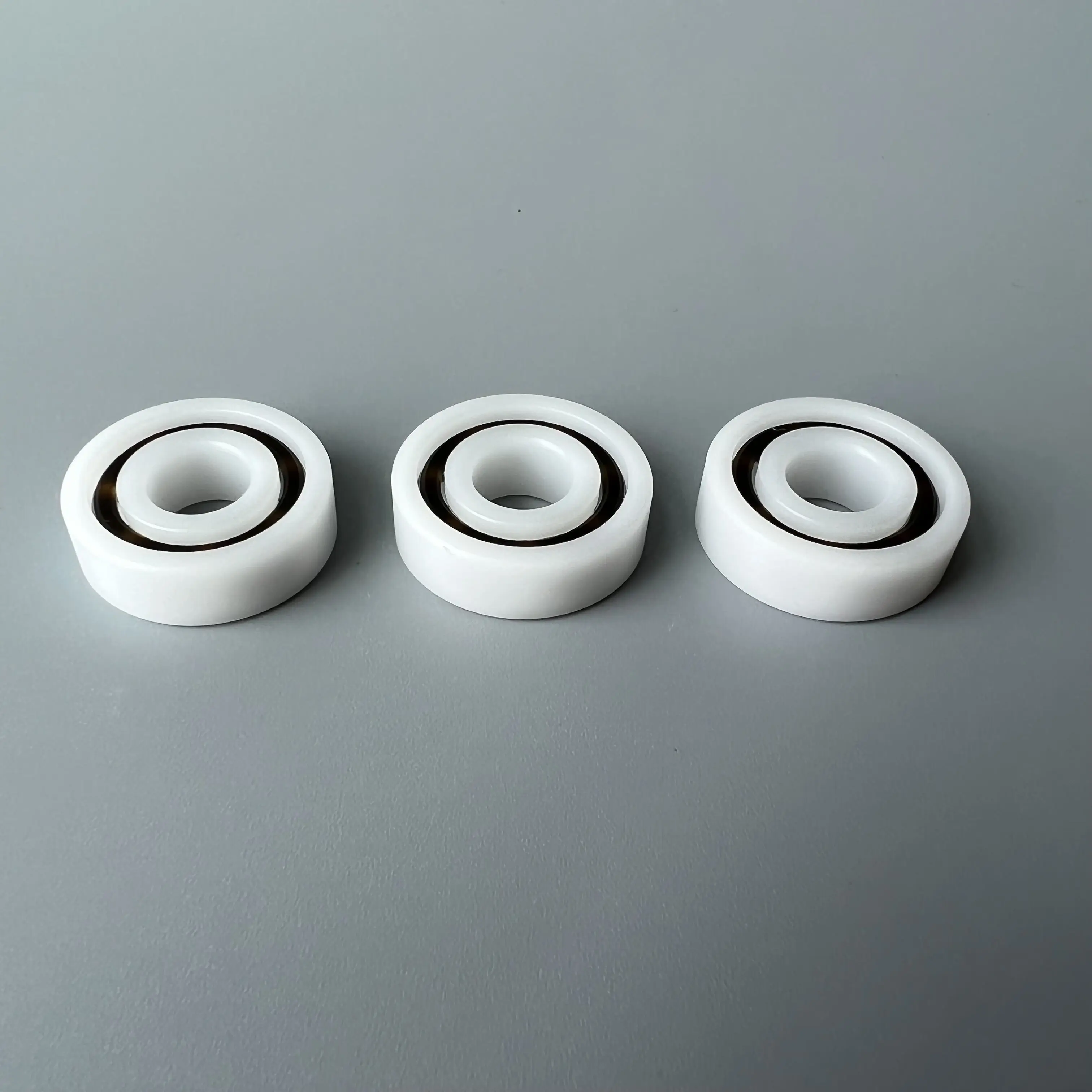 Plastic shaft bearing for Noritsu LPS24