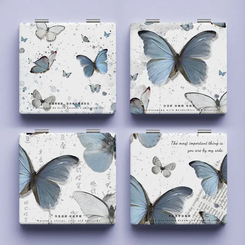 Espejo de mano para estudiante de mano con mariposa artística de estilo frío, mini espejo de maquillaje portátil plegable de doble cara