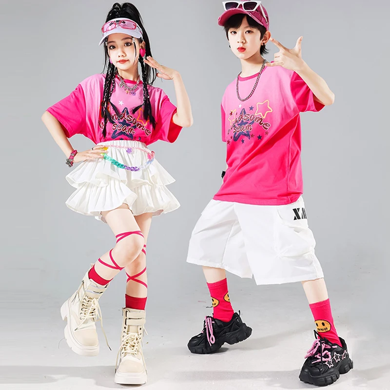 

Boys Girls Hip Hop Stage Show Outfit Jazz Dance Performance Clothes K-Pop Urban Kids Wear Pink Tops White Shorts Skirt AMY484