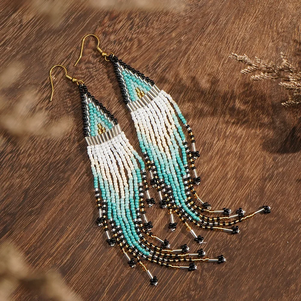 

Серьги с кисточками из сплава в богемном стиле, ручное вязание, геометрический дизайн, простые рисовые бусины, оригинальные украшения для ушей