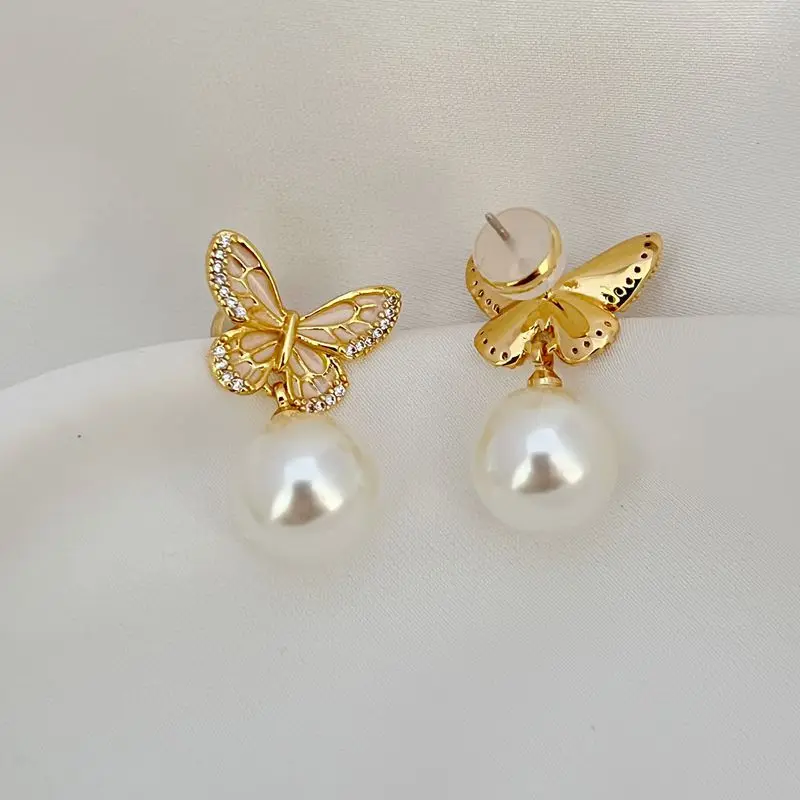 New Year Fashionable Enamel Craft Light Luxury Pearlescent White Pearl Butterfly Zircon Elegant Lady Style Exquisite Earrings