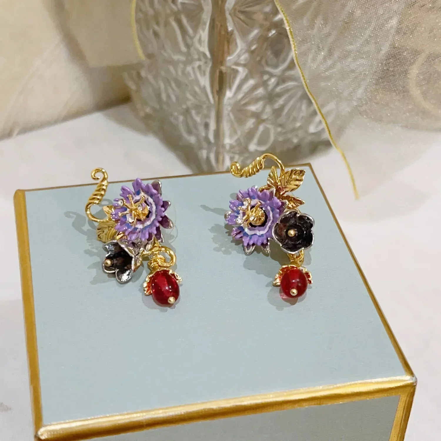 enamel headpiece jewelry, Cosmic Flower series, passion flower and red bead earrings, earrings, studs, and ear clips