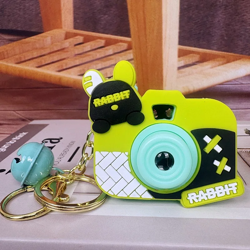 Mini proyector de cámara de oso lindo de dibujos animados creativos de moda, llavero de juguete, decoración de mochila, colgante de llave de coche, regalo divertido pequeño