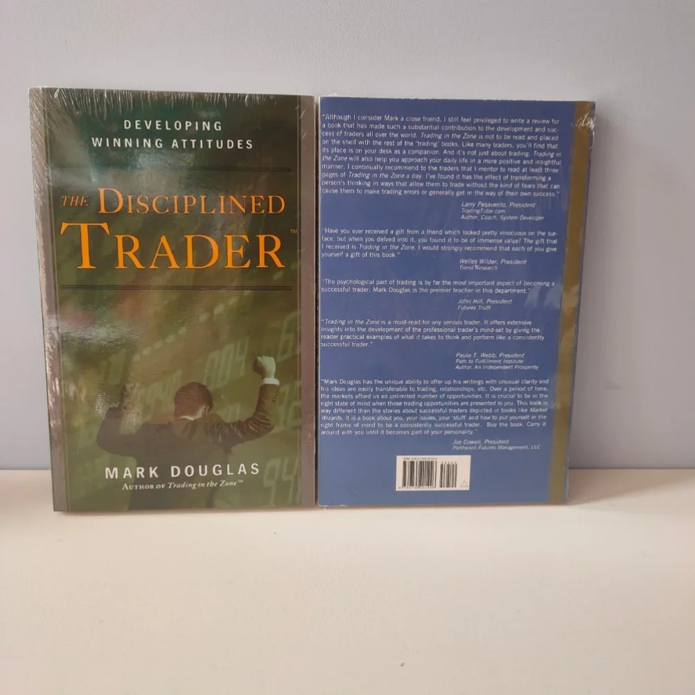 تجارة مارك دوغلاس في المنطقة وغلاف ورقي لكتب التاجر المنضبط باللغة الإنجليزية